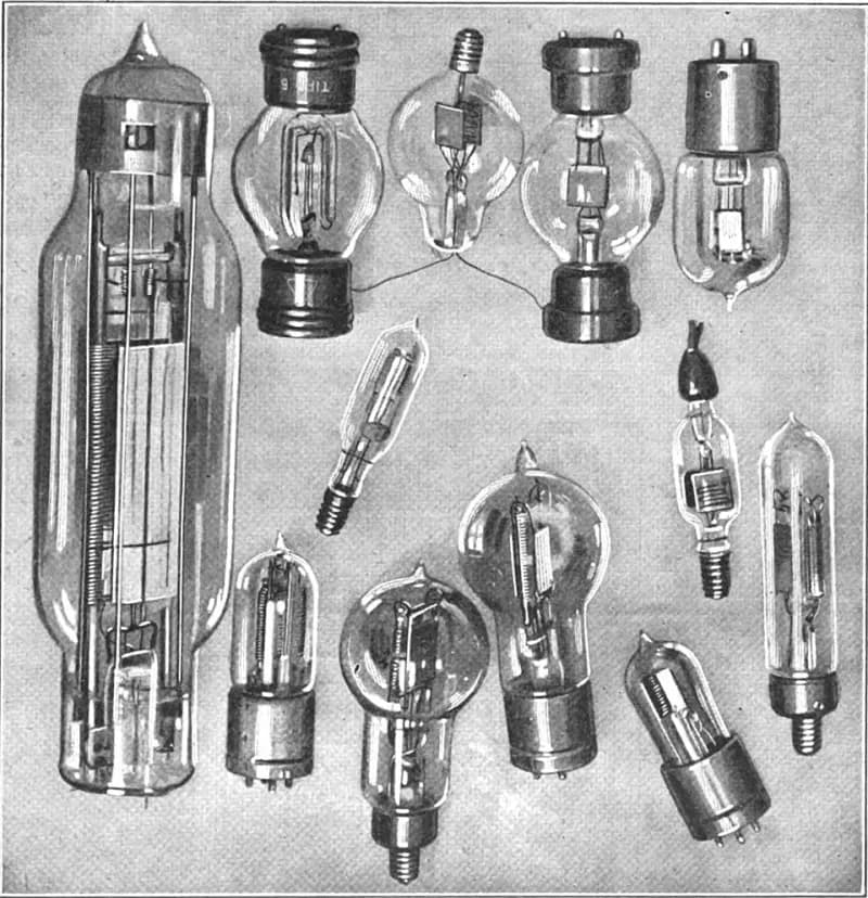 A collection of early glass vacuum tubes of different shapes and sizes.